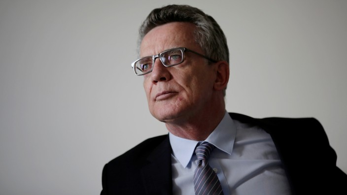 German Interior Minister de Maiziere during a Reuters interview in Berlin