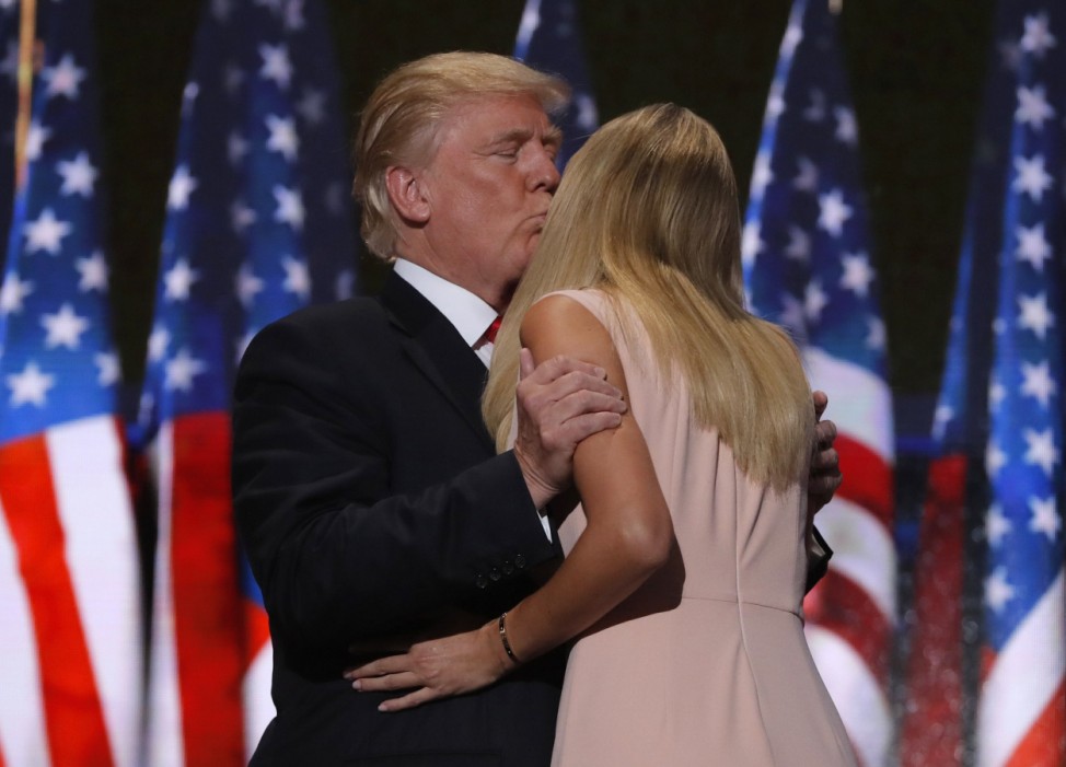 Republican U.S. presidential nominee Donald Trump kisses his daughter Ivanka as he arrives to speak during the final session  at the Republican National Convention in Cleveland