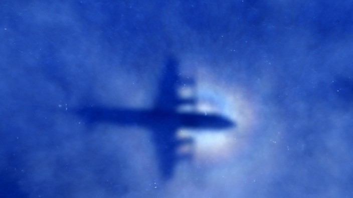 File photo of shadow of a Royal New Zealand Air Force (RNZAF) P3 Orion maritime search aircraft on low-level clouds as it flies over the southern Indian Ocean looking for missing Malaysian Airlines flight MH370