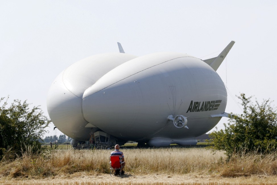 The Airlander 10 hybrid airship undergoes checks before its maiden flight at Cardington Airfield in Britain