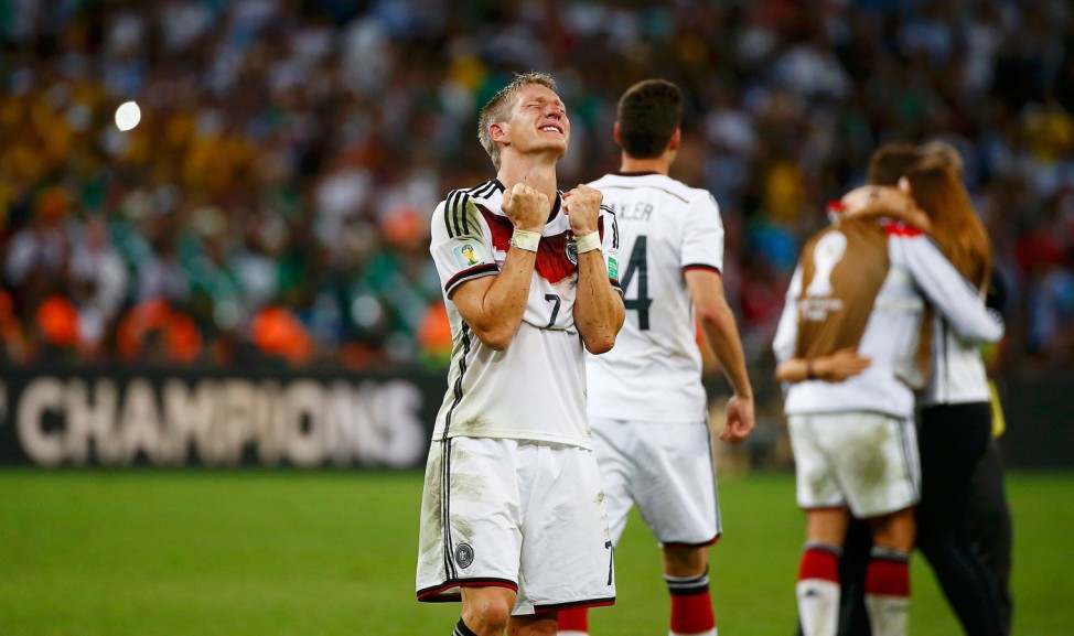 Germany's Bastian Schweinsteiger reacts after the whistle during extra time in the 2014 World Cup final between Germany and Argentina at the Maracana stadium