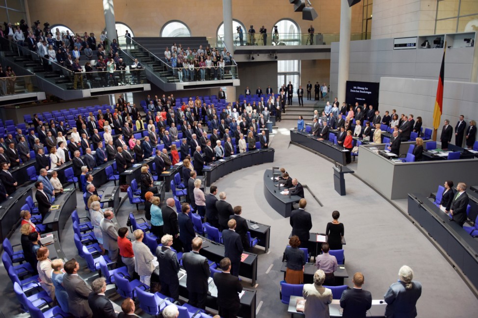 Members of the parliament stand to honour former German President Scheel before a meeting at lower house of parliament Bundestag on 2017 budget in Berlin