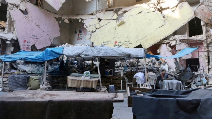 A file photo shows empty vegetable stalls in Aleppo's rebel-controlled Bustan al-Qasr neighbourhood due to a siege by Syrian pro-government forces that cut the supply lines into opposition-held areas of the city