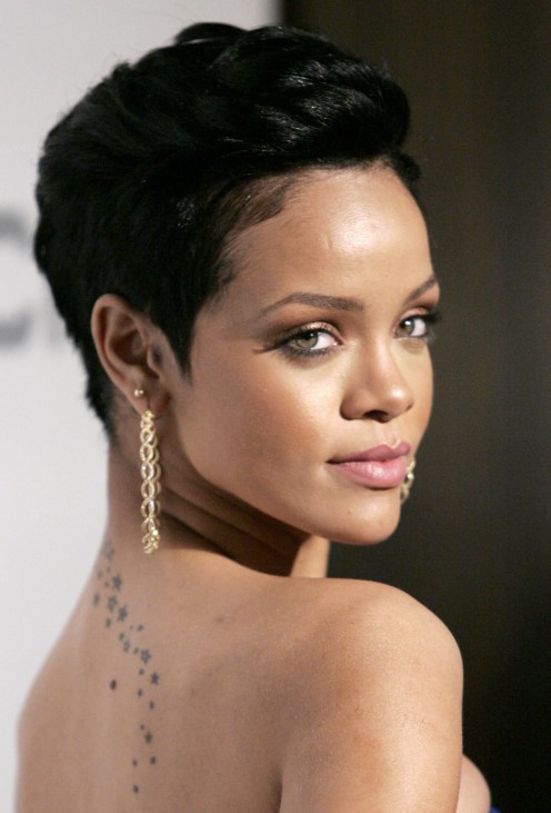 Rihanna arrives at the Recording Academy's Clive Davis pre-Grammy party in Beverly Hills, California