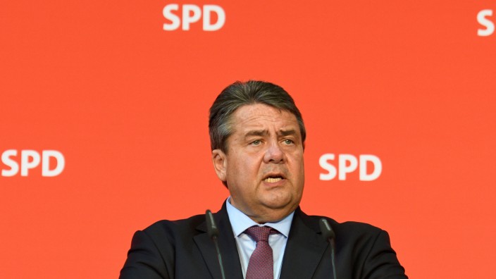 German Economy Minister Sigmar Gabriel addresses media after a voting of Germany's Social Democrats in Wolfsburg