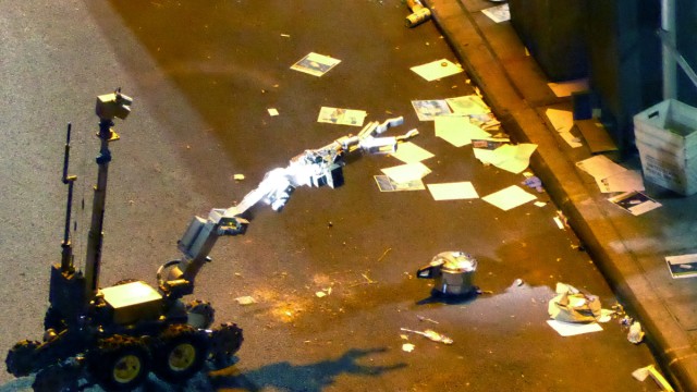 A New York Police Department (NYPD) robot retrieves an unexploded pressure cooker bomb in New York