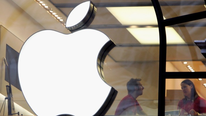 File: Apple In Talks to Buy Mclaren Bargain Hunters Hit The Streets As Sales Begin