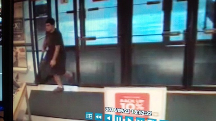 An image taken from security video of the gunman who opened fire in the Cascade Mall in Burlington