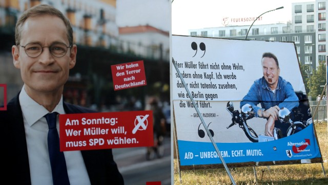Election posters of top candidate of Social Democratic Party and Mayor of Berlin Mueller and top candidate of the anti-immigration party Alternative for Germany Pazderski for local city elections are pictured in Berlin