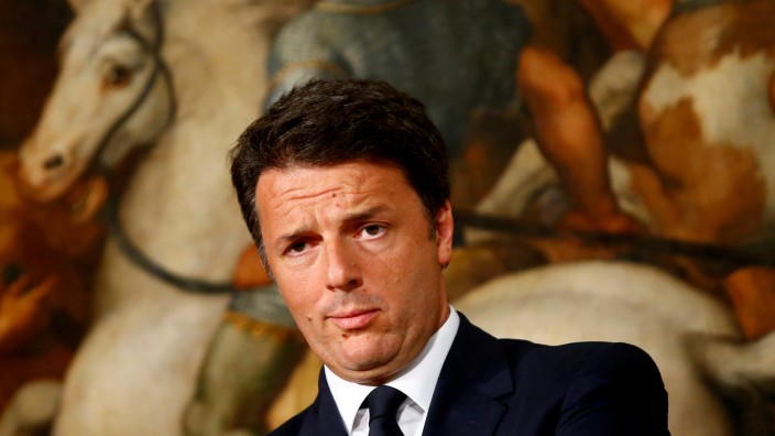Italy Prime Minister Matteo Renzi looks on during a news conference at Chigi Palace in Rome