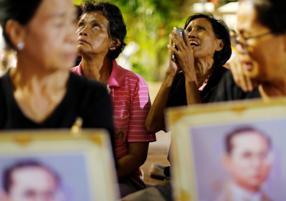 Well-wishers pray outside Thailand's King Bhumibol Adulyadej at the Siriraj hospital where he is residing in Bangkok