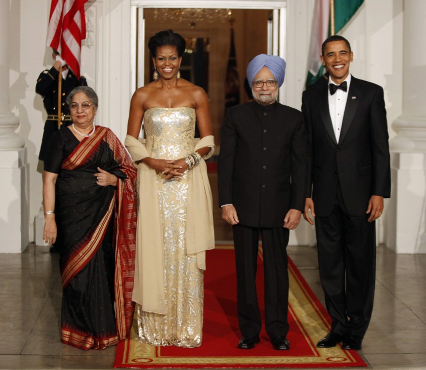 U.S. President Obama and first lady Obama pose with India's Prime Minister Singh and his wife Kaur before a state dinner at the White House in Washington