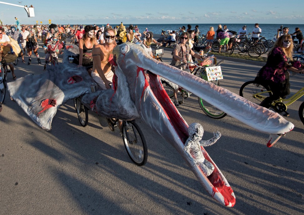 A zombie pelican bicycle is manoeuvred on South Roosevelt Boulevard during the Zombie Bike Ride as part of annual Fantasy Fest costuming and masking festival in Key West