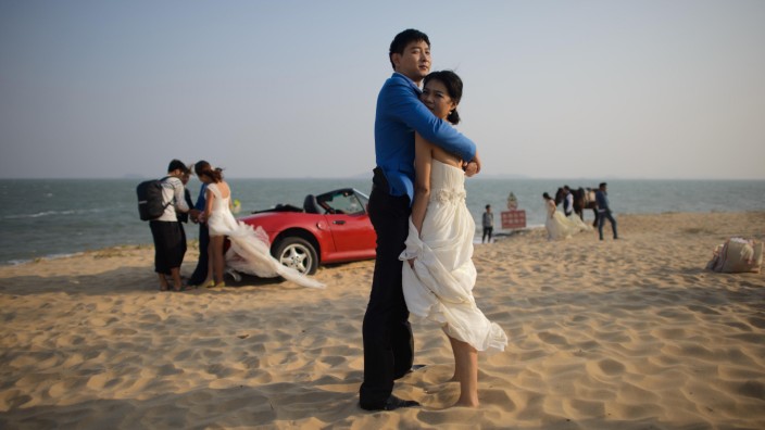 China und Deutschland: Hochzeitsfotos werden im chinesischen Xiamen aufwendig inszeniert. Im Fall von Aixtron wird es damit noch etwas dauern.