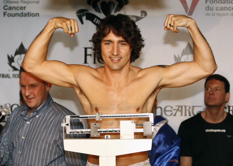 File of  Liberal MP Trudeau gesturing while weighing-in for a charity boxing match in Ottawa