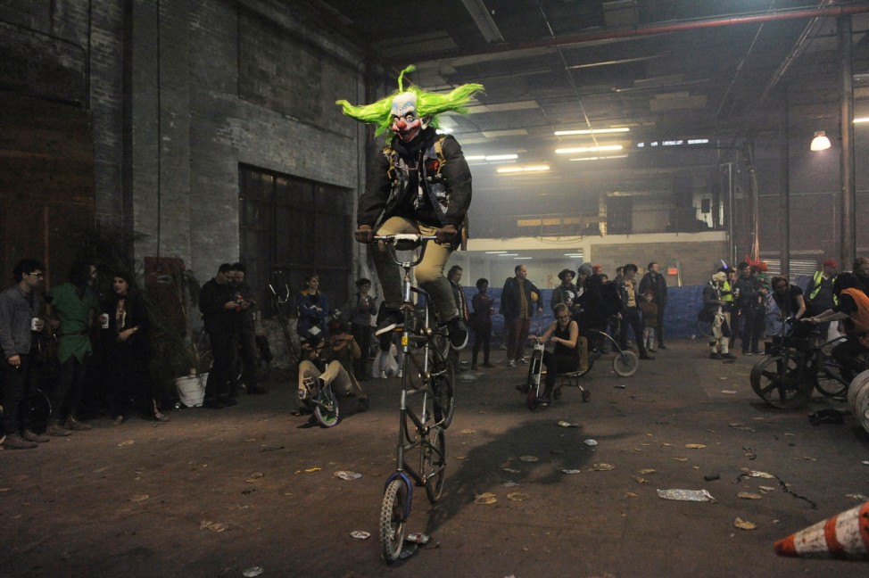 People ride bicycles in Halloween costumes during 'Bike Kill 13' in the Brooklyn borough of New York City