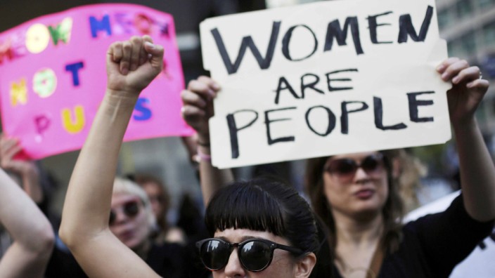 Women take part in a protest against Republican presidential candidate Donald Trump in Chicago