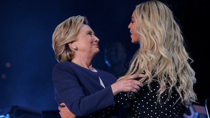 U.S. Democratic presidential nominee Hillary Clinton is joined by artist Beyonce at a campaign concert in Cleveland