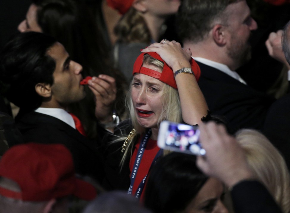 A supporter celebrates as returns come in for Republican U.S. presidential nominee Donald Trump during an election night rally in Manhattan