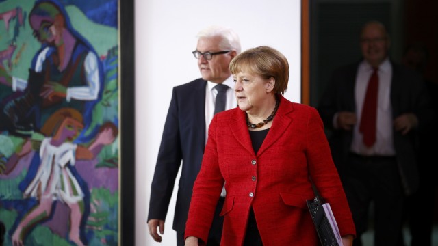 German Chancellor Merkel and FM Steinmeier arrive for the weekly cabinet meeting at the Chancellery in Berlin