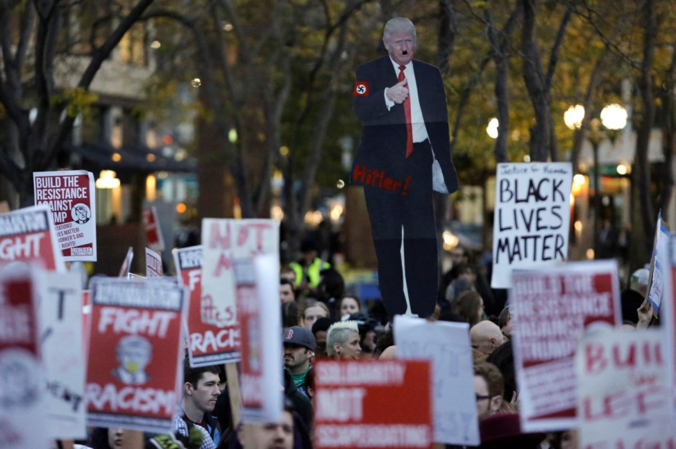 People gather in protest to the election of Republican Donald Trump as the president of the United States in Seattle