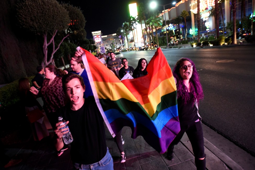 Pino Alessi and Monica Davila lead a protest march against the election of Republican Donald Trump as President of the United States, along the Las Vegas Strip in Las Vegas