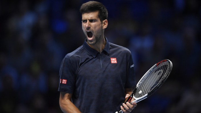 Serbia's Novak Djokovic reacts during his round robin match with Austria's Dominic Thiem