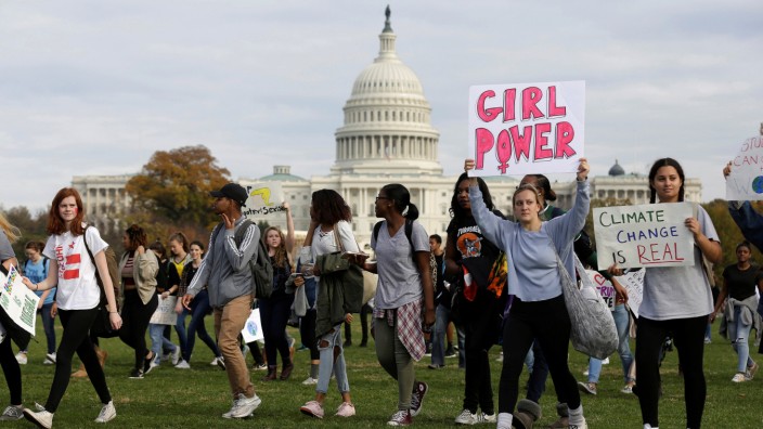 Students protest the election of President-elect Donald Trump during a march in Washington.