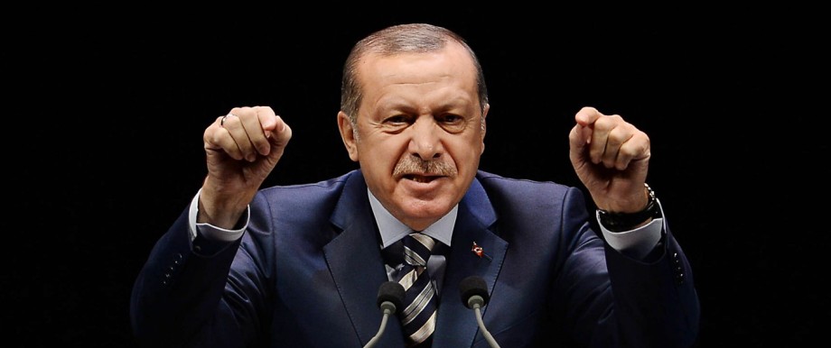 Turkish President Recep Tayyip Erdogan addresses at the meeting of War Veterans and Martyr Relatives