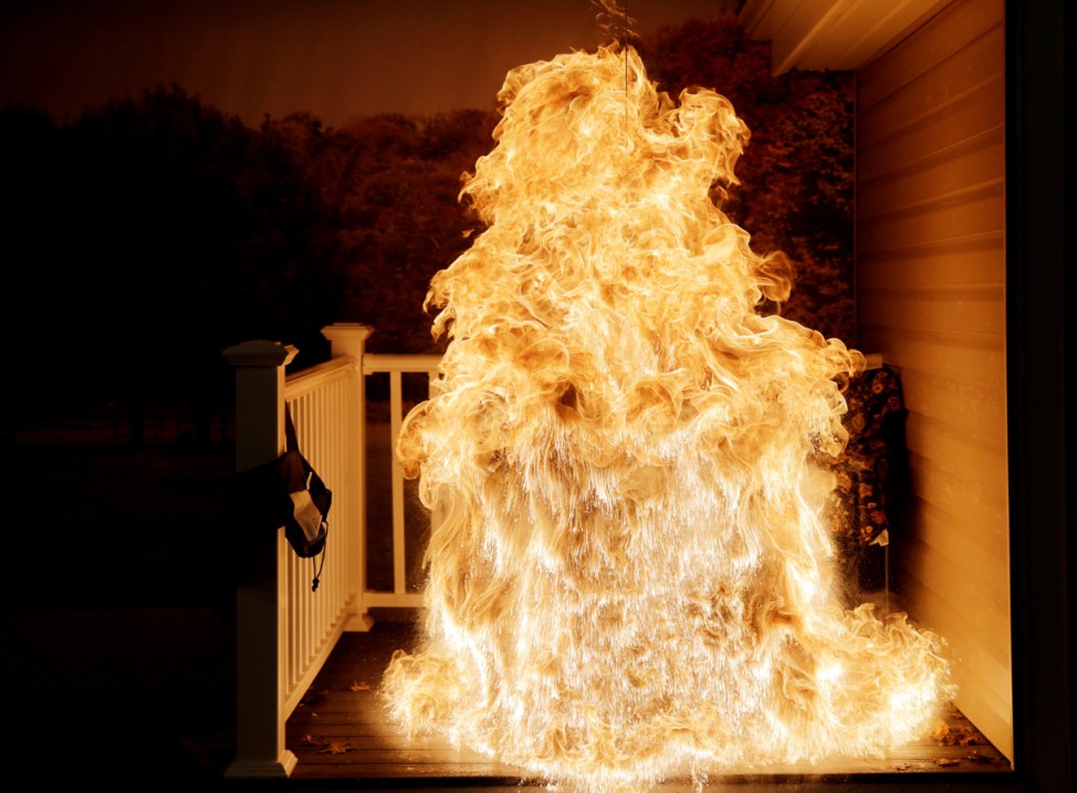 Frozen turkey is dropped into deep fryer and creates a large fireball at a food safety demonstration in Rockville