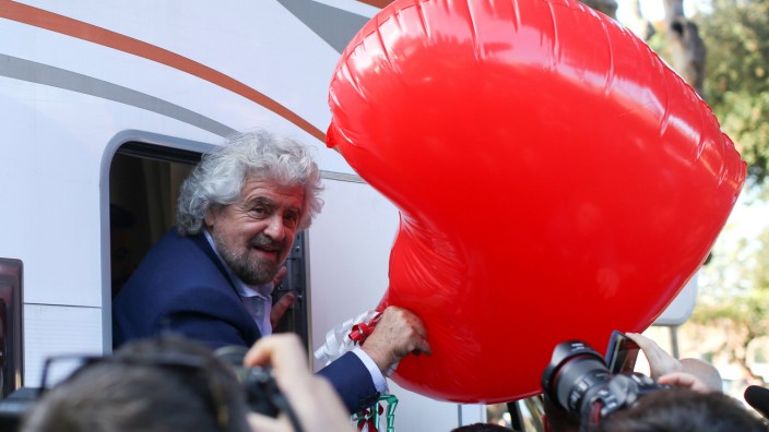 Beppe Grillo, the founder of the anti-establishment 5-Star Movement, arrives to attend a march in support of the 'No' vote in the upcoming constitutional reform referendum in Rome