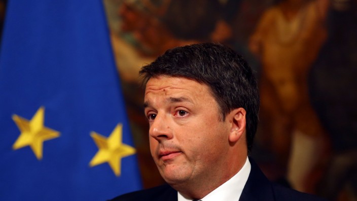 Italian Prime Minister Matteo Renzi looks on during a media conference after a referendum on constitutional reform at Chigi palace in Rome