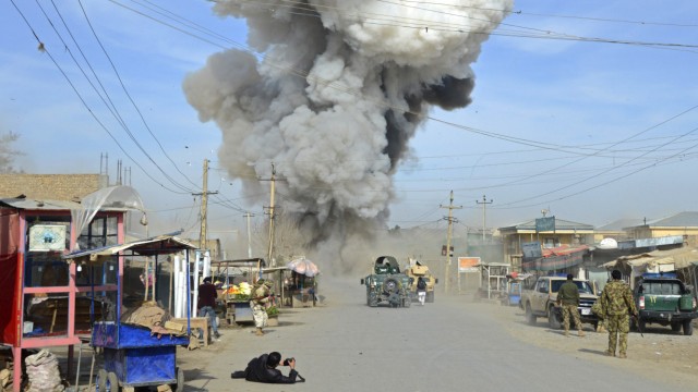 Smoke rises in the sky after a suicide car bomb attack in Kunduz