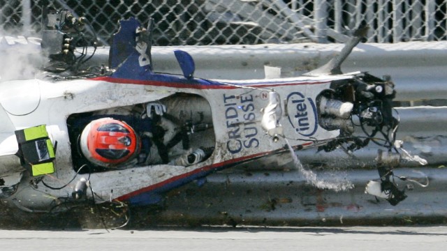 BMW Formula One driver Robert Kubica of Poland crashes during the Canadian F1 Grand Prix in Montreal