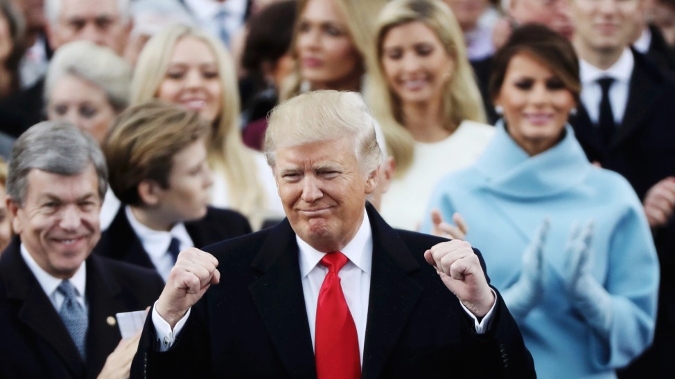 President Donald Trump celebrates after inauguration ceremonies swearing him in as the 45th president of the United States on the West front of the U.S. Capitol in Washington