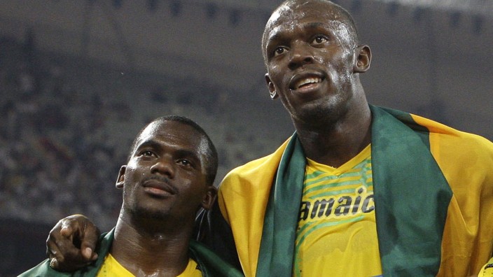 Leichtathletik: Nesta Carter und Usain Bolt (re.): In Peking zusammen zu Gold gerannt