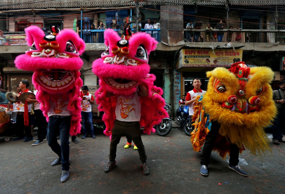 Members of the Chinese community perform a lion dance as they take part in celebrations to mark the Chinese New Year in Kolkata