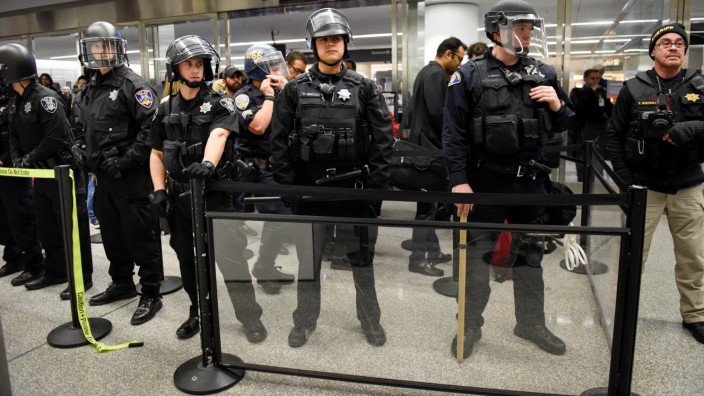 Police block a security check point inside Terminal 4 at San Francisco International Airport in San Francisco