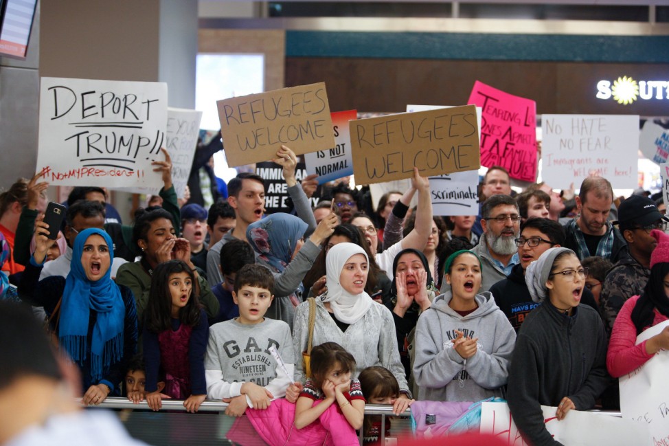 Activists Protest Muslim Immigration Ban At Dallas Fort-Worth Airport