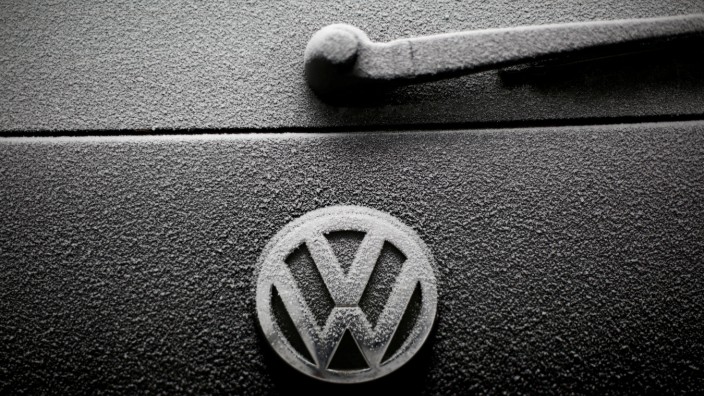FILE PHOTO:  Snowflakes are seen on the badge of a Volkswagen car in Warsaw