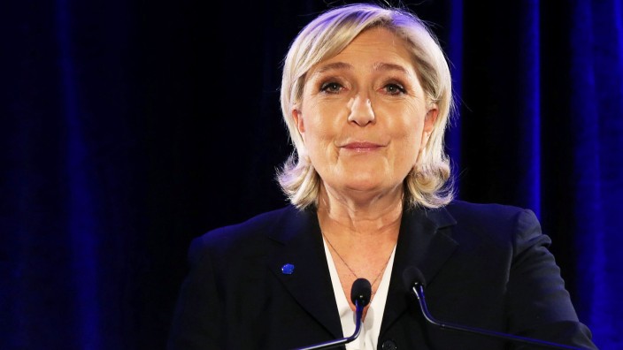 Marine Le Pen, French National Front (FN) political party leader and candidate for French 2017 presidential election, attends a news conference in Paris