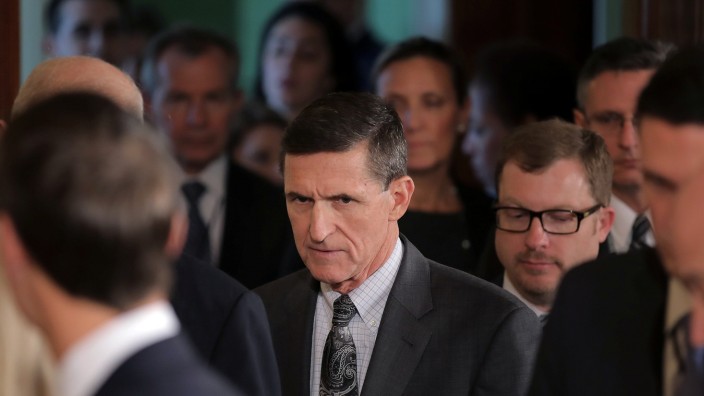 White House National Security Advisor Michael Flynn (C) arrives prior to a joint news conference between Canadian Prime Minister Justin Trudeau and U.S. President Donald Trump at the White House in Washington, U.S.