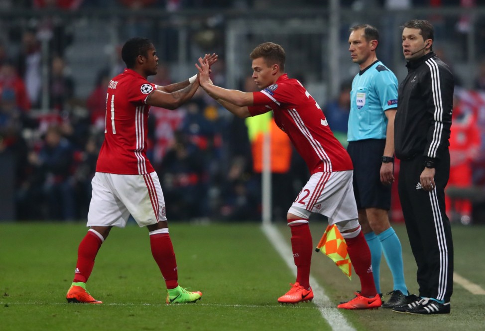 Bayern Munich's Joshua Kimmich comes on as a substitute to replace Douglas Costa