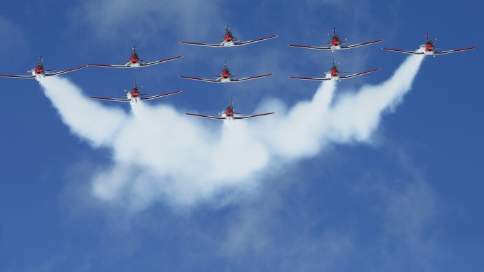 Members of the Swiss aerobatic team Patrouille Swiss fly in formation over the valley of St. Moritz during an airshow for the FIS Alpine World Skiing Championships in St. Moritz