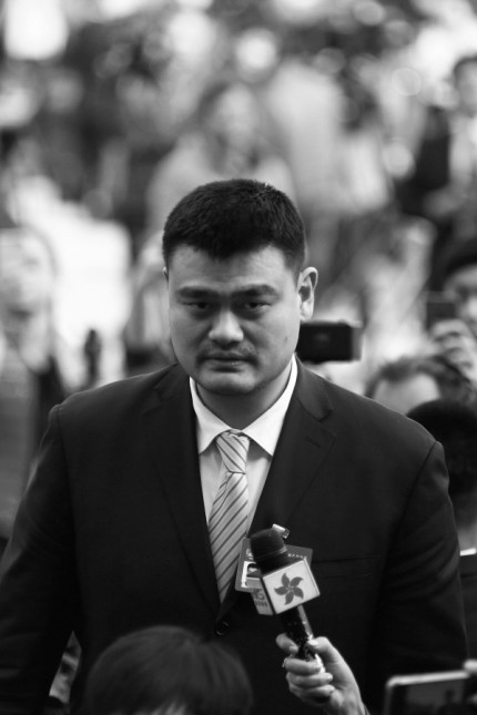 Yao Ming, a delegate and a former NBA player arrives near the Great Hall of the People before the opening session of the Chinese People's Political Consultative Conference (CPPCC) in Beijing