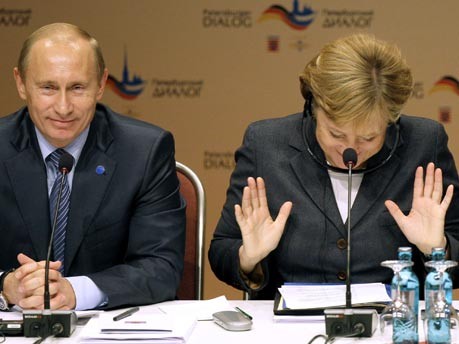 Putin, Merkel, AP