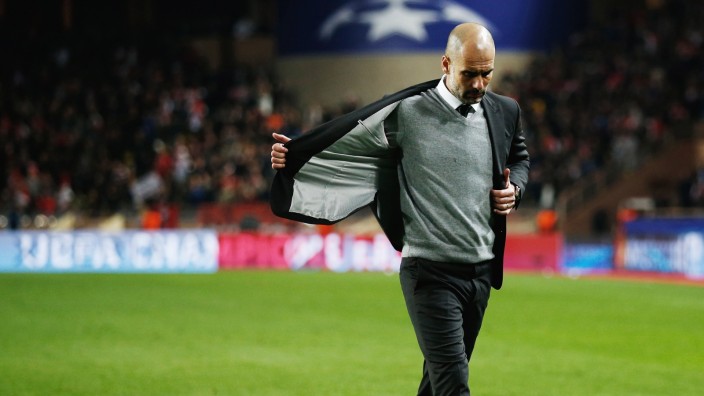 Manchester City manager Pep Guardiola looks dejected after the game