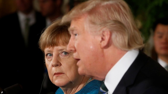 Merkel and Trump hold a joint news conference in the East Room of the White House in Washington