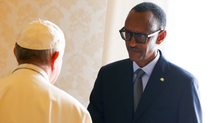 Rwanda's President Paul Kagame greets Pope Francis during a private meeting at the Vatican