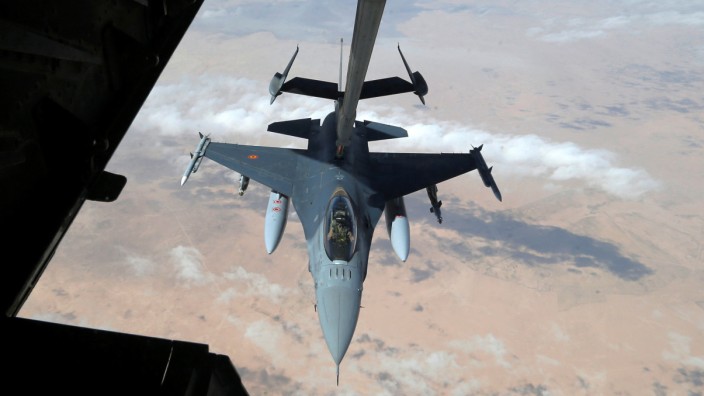 US Air Force F-16 receives fuel from fuel boom suspended from US Air Force KC-10 Extender during mid-air refueling support to Operation Inherent Resolve over Iraq and Syria air space